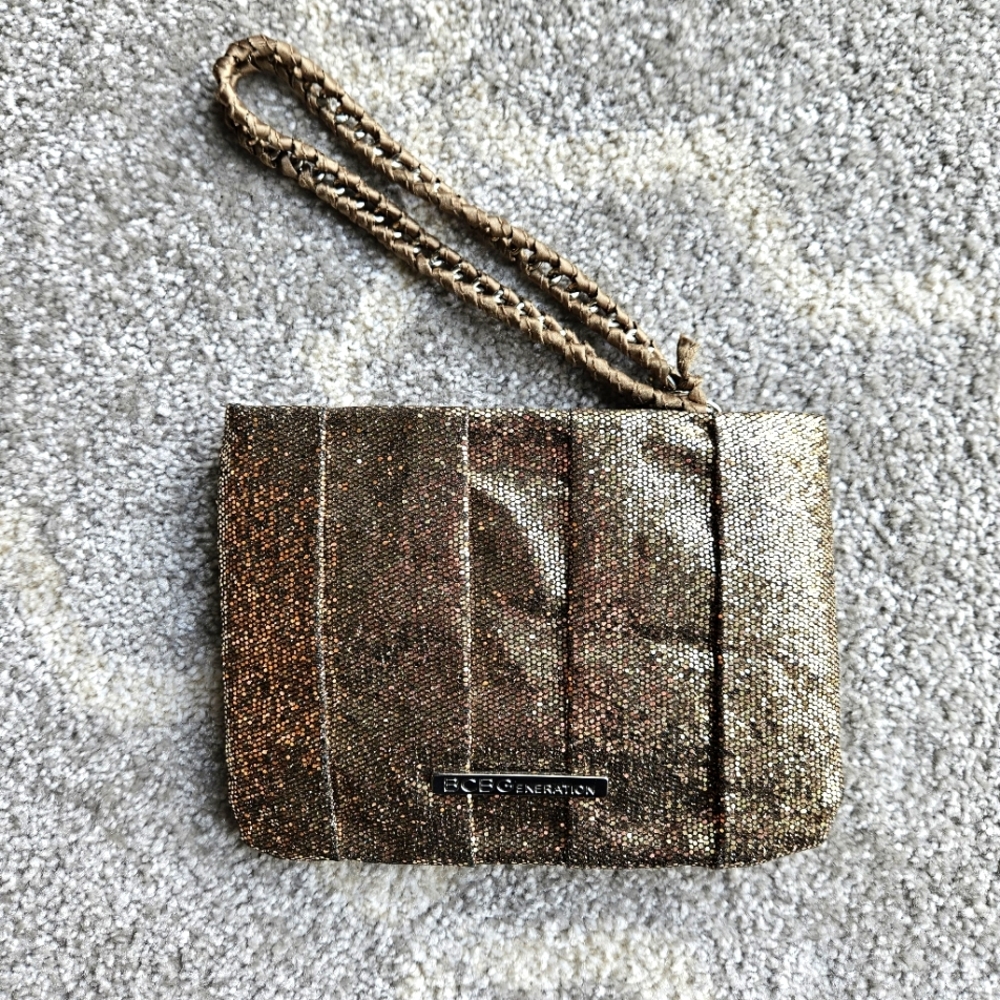 SOLD BCBGeneration Metallic Gold Wristlet